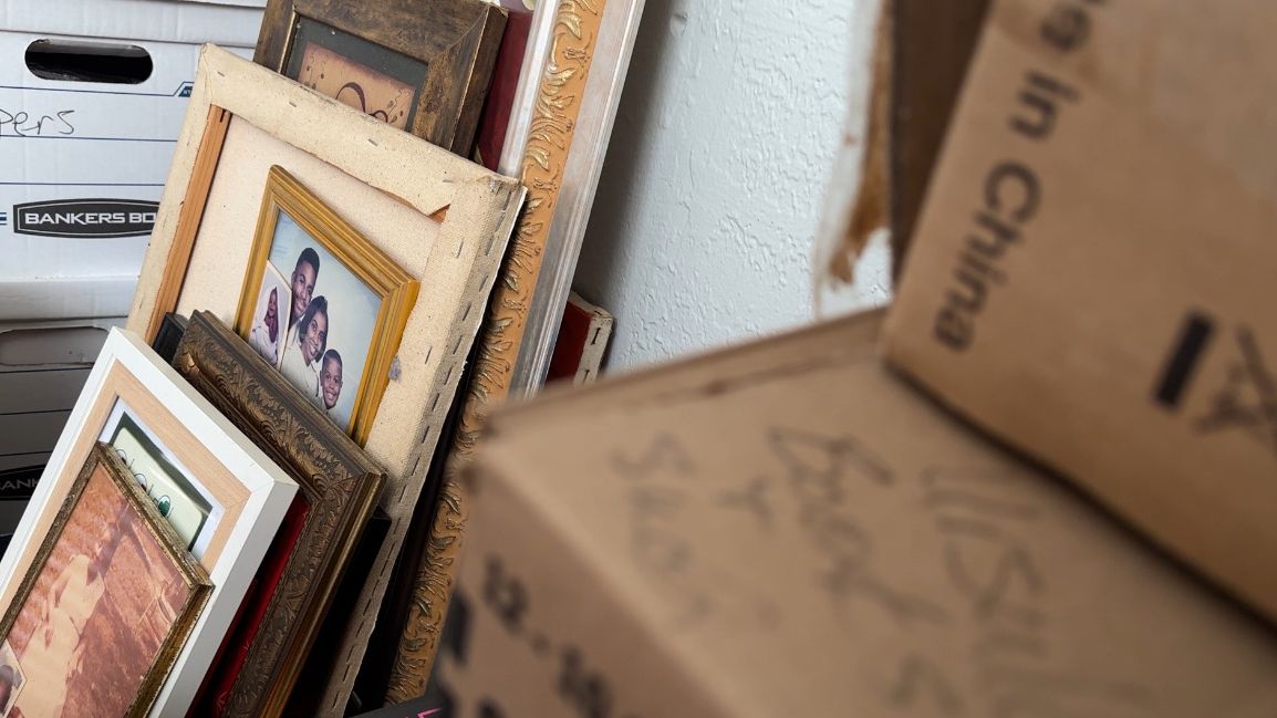 Items in one of Geraldine’s rooms show items being packed for the move. (Spectrum News 13/Devin Martin)