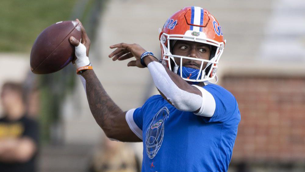 Florida quarterback Emory Jones warms up for the team's NCAA college football game against Missouri on Saturday, Nov. 20, 2021, in Columbia, Mo. Jones is leaving Florida after just two days of spring practice. Jones announced Saturday, March 19, 2022, he is entering the NCAA transfer portal, an about-face for a fifth-year senior who earlier this week said he wanted to give new coach Billy Napier and his staff a chance. (AP Photo/L.G. Patterson)