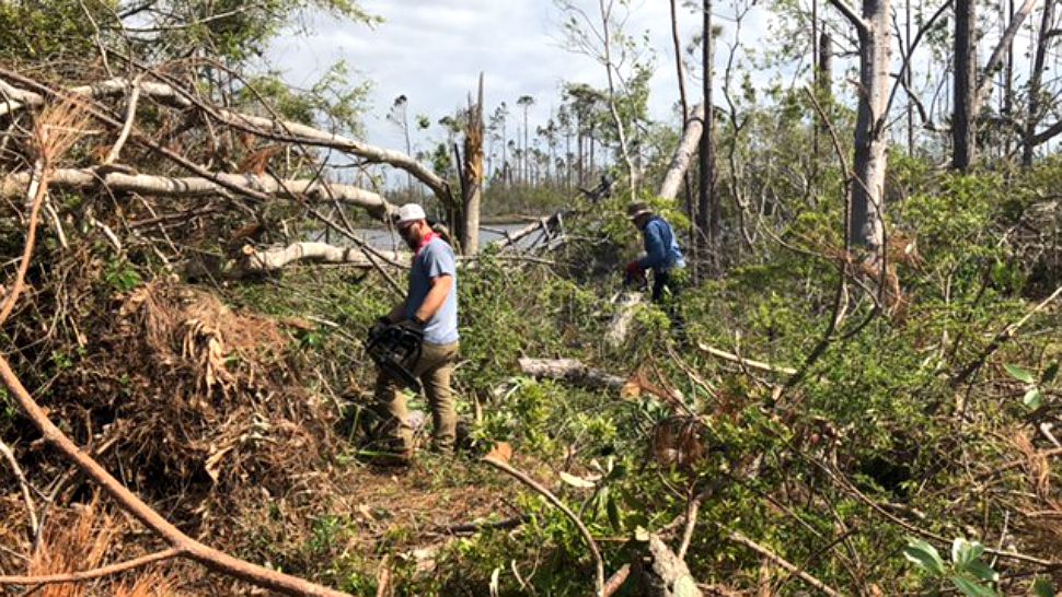 UCF students spent their spring break helping out people in the Panhandle hit hard by Hurricane Michael. (Spectrum News image)