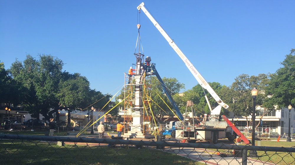 After years of debate, and a federal lawsuit, the confederate monument in Lakeland’s downtown Munn Park is being taken down and moved to Veterans Memorial Park, about a mile down the road behind the RP Funding Center. (Stephanie Claytor/Spectrum News)