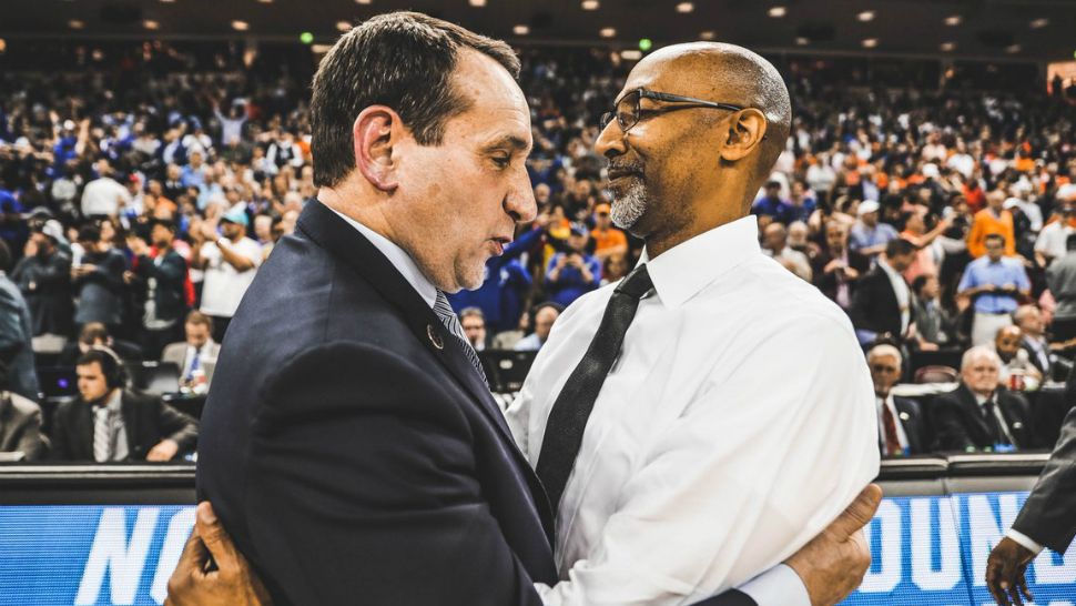 Duke coach Mike Krzyzewski and UCF coach Johnny Dawkins embrace after Sunday's game. Dawkins played for the Duke coach in the 1980s. (UCF Basketball Twitter feed)