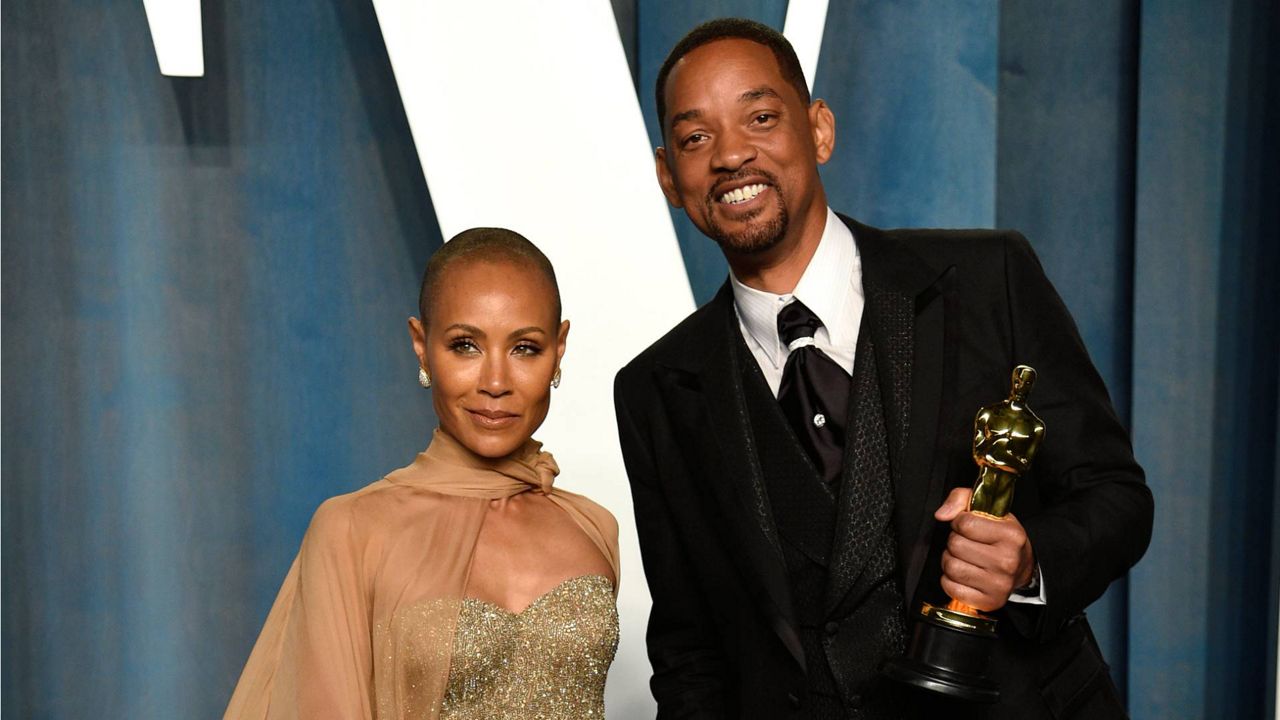 Jada Pinkett Smith, left, and Will Smith arrive at the Vanity Fair Oscar Party on Sunday, March 27, 2022, at the Wallis Annenberg Center for the Performing Arts in Beverly Hills, Calif. (Photo by Evan Agostini/Invision/AP)