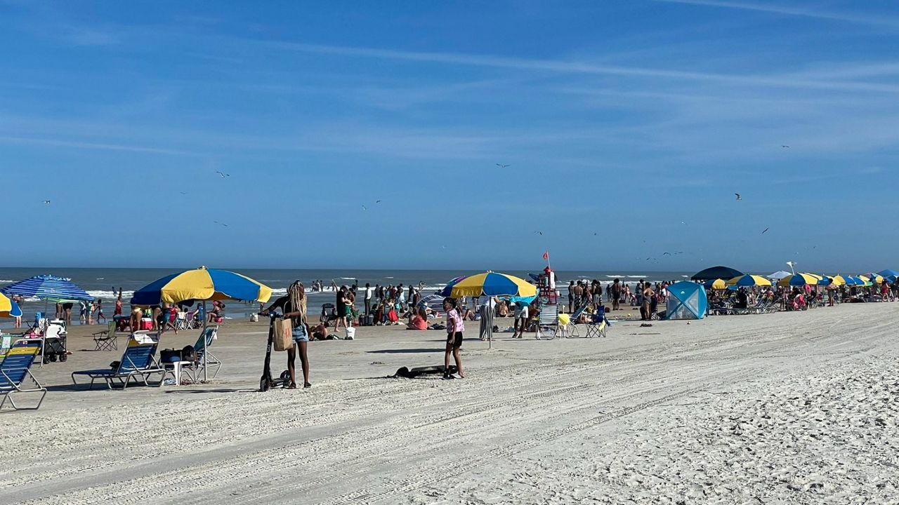 All along Daytona Beach, spring breakers lined the sand taking in the beautiful weather. (Nicole Griffin/Spectrum News 13)