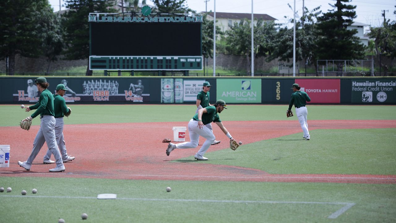 The Hawaii baseball team, seen at a 2023 practice, is expected to put in another season on its aging DomoTurf at Les Murakami Stadium in 2024.