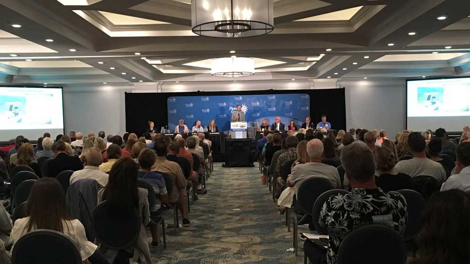 Attendees listen to panelists during a Red Tide Summit at the Sheraton Sand Key Resort in Clearwater, Thursday, March 28, 2019. (Laurie Davison/Spectrum Bay News 9)