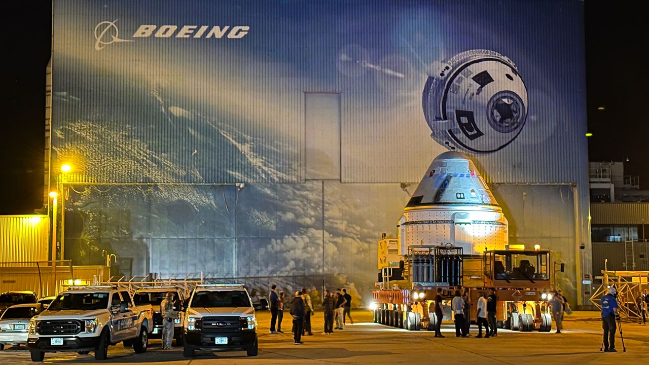 Boeing rolled out its Starliner spacecraft from the Commercial Crew and Cargo Processing Facility at NASA’s Kennedy Space Center to the Vertical Integration Facility at nearby Cape Canaveral Space Force Station on Tuesday, April 16, 2024. (Spectrum News/Jon Shaban)