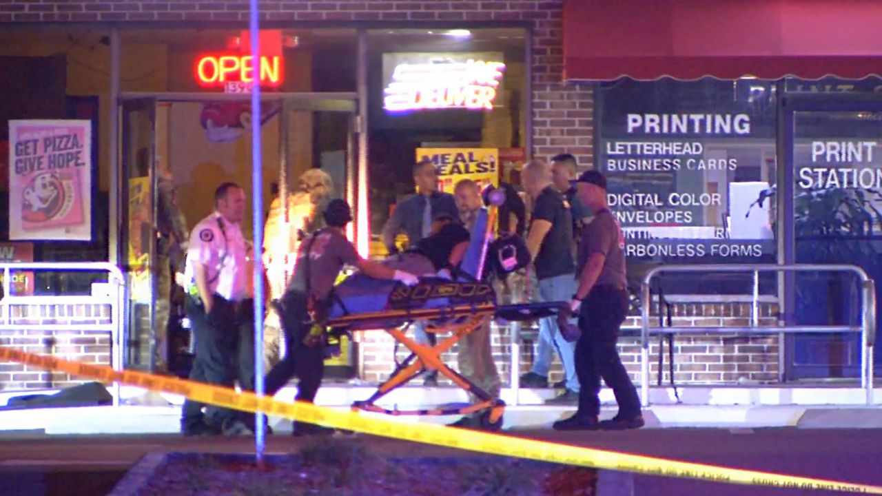 It appeared a stretcher was used to bring out Neal Pittard. It is not known what type of injuries Pittard may have sustained. Authorities say that he allegedly held an employee at the Hungry Howie’s in Altamonte Springs hostage from early Monday evening into early Tuesday morning. (Spectrum News)