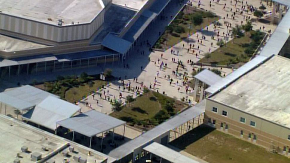 The walkout at Lake Nona High School in Orlando on Friday, April 20, 2018, is just the latest as students revolt against gun laws and gun violence in schools. (Sky 13)