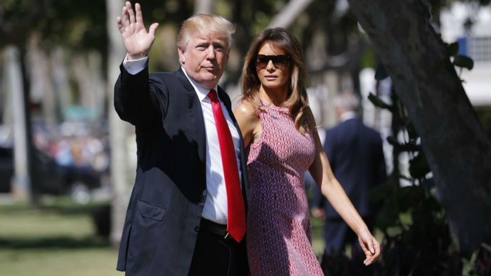 President Donald Trump and first lady Melania Trump arrive for Easter services at Episcopal Church of Bethesda-by-the-Sea, in Palm Beach, Fla., Sunday, April 1, 2018. (AP Photo/Pablo Martinez Monsivais)