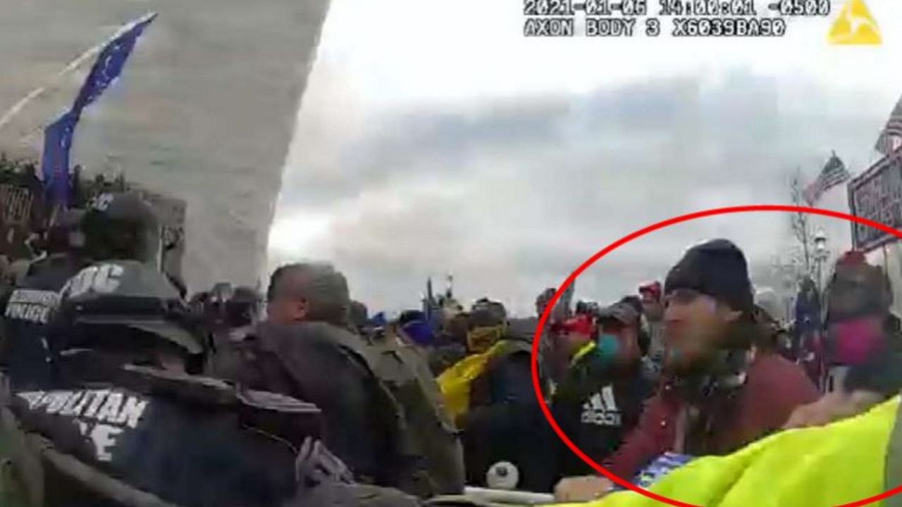 Federal prosecutors say this image, captured on a law enforcement officer's body camera, shows Grady Owens at the U.S. Capitol during the January 6 siege. (Screen capture from federal documents)