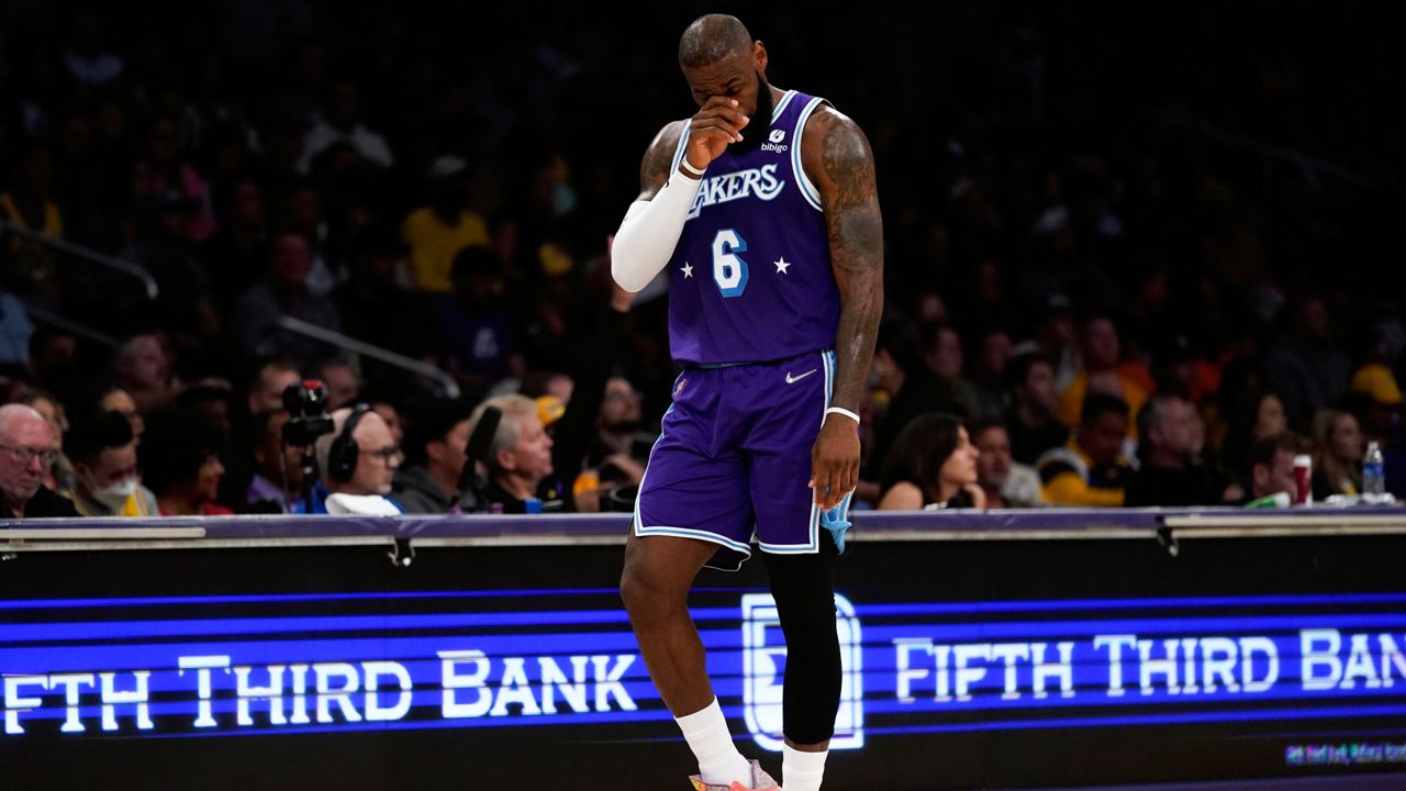 Los Angeles Lakers forward LeBron James (6) reacts to a foul call during the first half of an NBA basketball game against the New Orleans Pelicans in Los Angeles, Friday, April 1, 2022. (AP Photo/Ashley Landis)