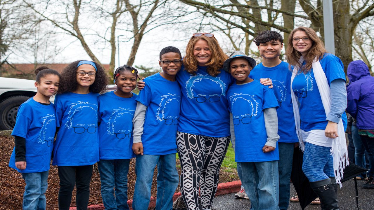 This March 20, 2016 photo shows Hart family of Woodland, Wash., at a Bernie Sanders rally in Vancouver, Wash. Authorities in Northern California say they believe all six children from a family were in a vehicle that plunged off a coastal cliff. Mendocino County Sheriff Tom Allmon told reporters Wednesday, March 28, 2018, that only three bodies of the children have been recovered. Their parents also died Monday. (Tristan Fortsch/KATU News via AP)