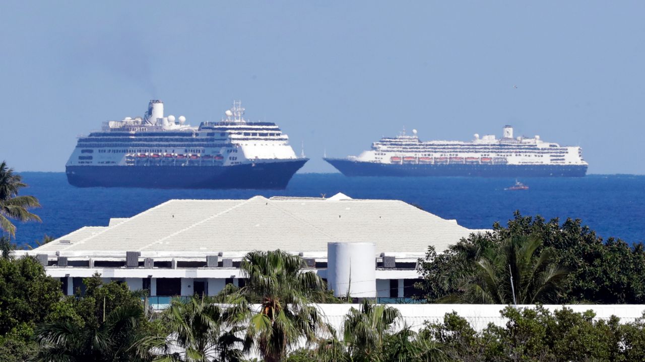 The cruise ships Zaandam (foreground) and Rotterdam make their way to Port Everglades on Thursday, April 2, off the coast of Fort Lauderdale. (Wilfredo Lee/AP)