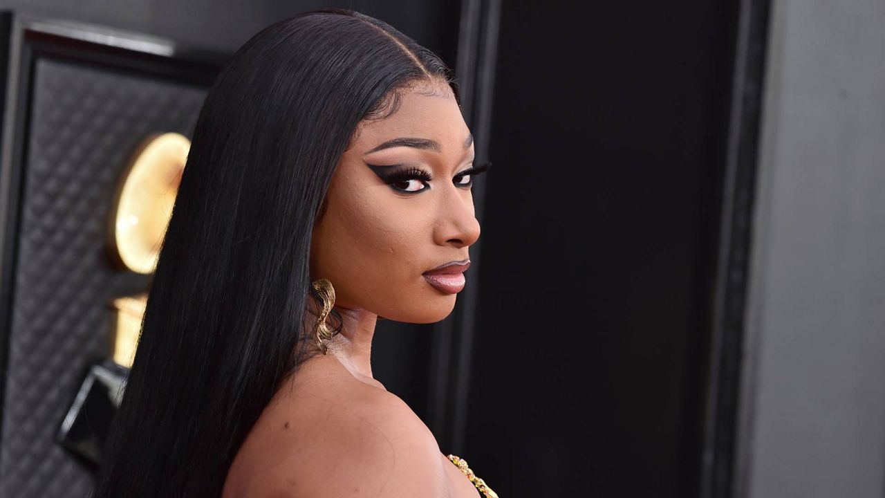 Megan Thee Stallion arrives at the 64th Annual Grammy Awards at the MGM Grand Garden Arena on Sunday, April 3, 2022, in Las Vegas. (Photo by Jordan Strauss/Invision/AP)