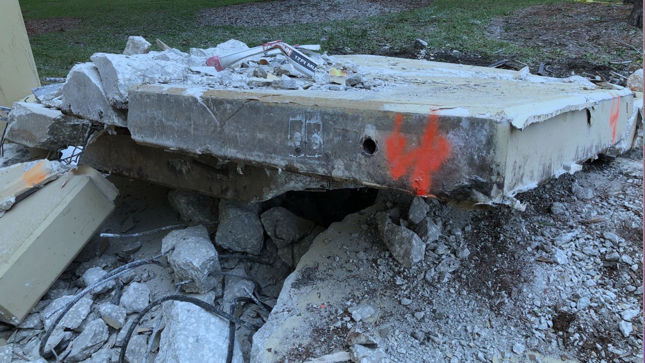 In a newly released report, a witness says the parking garage collapsed without warning. It crushed and killed a welder who was standing on a ladder on the bottom floor. Clearwater police released this photo Monday.