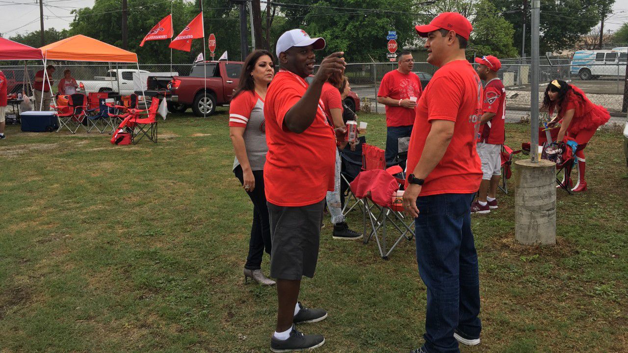 Commander fans tailgating outside Alamo Distilling Co. (Spectrum News)