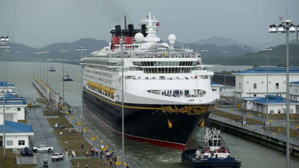 The Disney Wonder cruise ship sails toward the Cocoli Locks, part of the new Panama Canal expansion in Cocoli, Panama, Saturday, April 29, 2017. The ship is the first cruiser to sail through the expanded locks. (AP Photo/Arnulfo Franco)