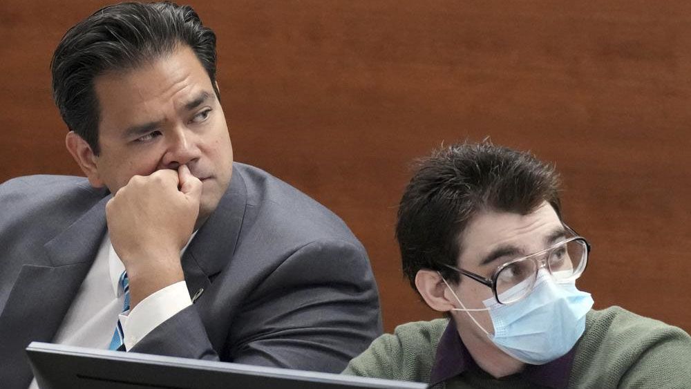 Chief Assistant Public Defender David Wheeler is shown at the defense table with Marjory Stoneman Douglas High School shooter Nikolas Cruz during jury pre-selection in the penalty phase of his trial at the Broward County Courthouse in Fort Lauderdale on Monday, April 4, 2022. Cruz previously plead guilty to all 17 counts of premeditated murder and 17 counts of attempted murder in the 2018 shootings. (Amy Beth Bennett/South Florida Sun Sentinel via AP, Pool)
