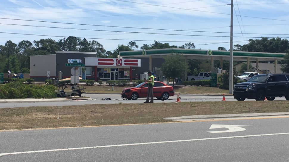 Golf cart, car collide; passenger in cart dies