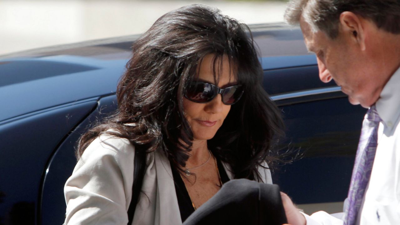 In this Friday, Oct. 19, 2012 file photo, Britney Spears' parents, Lynne Spears, left, and Jamie Spears arrive at court in Los Angeles. (AP Photo/Nick Ut, File)