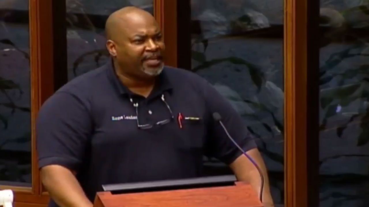 Mark Robinson at city council meeting discussing gun laws.