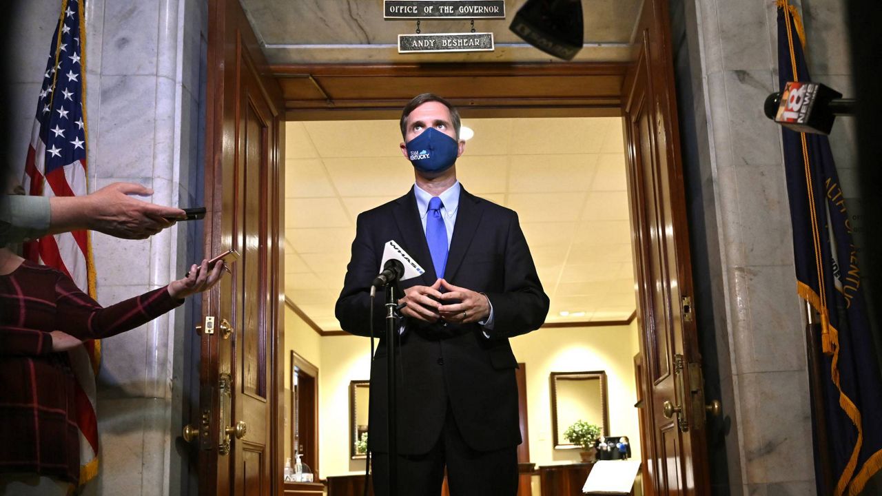 Temporary retraining order halts Gov. Beshear's mask mandate for private schools (AP Photo)