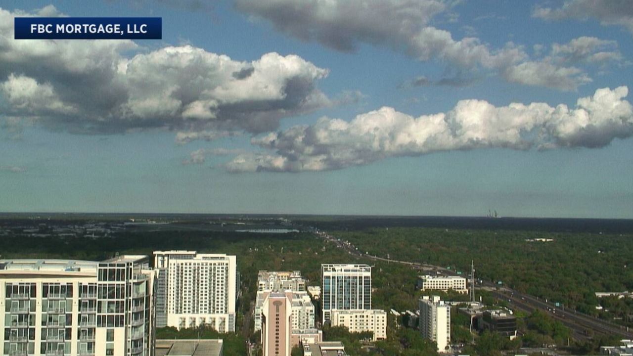 Clouds roll over a warm downtown Orlando on Tuesday afternoon. (Sky 13 weather camera)