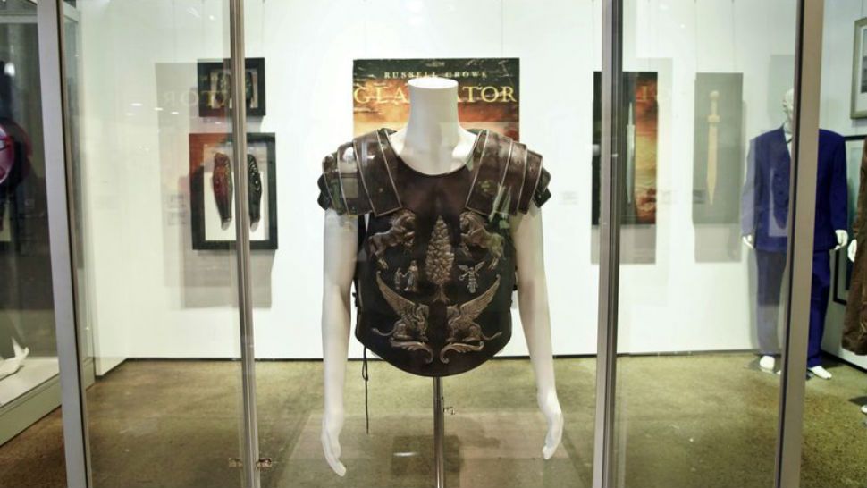 One of the costumes from the film Gladiator owned by actor Russell Crowe is on display to be auctioned by Sotheby's auction house as part of the 'Russell Crowe: The Art of Divorce Auction' at Carriageworks, Sydney, Australia Saturday, April 7, 2018. (Ben Rushton/AAP Image via AP)