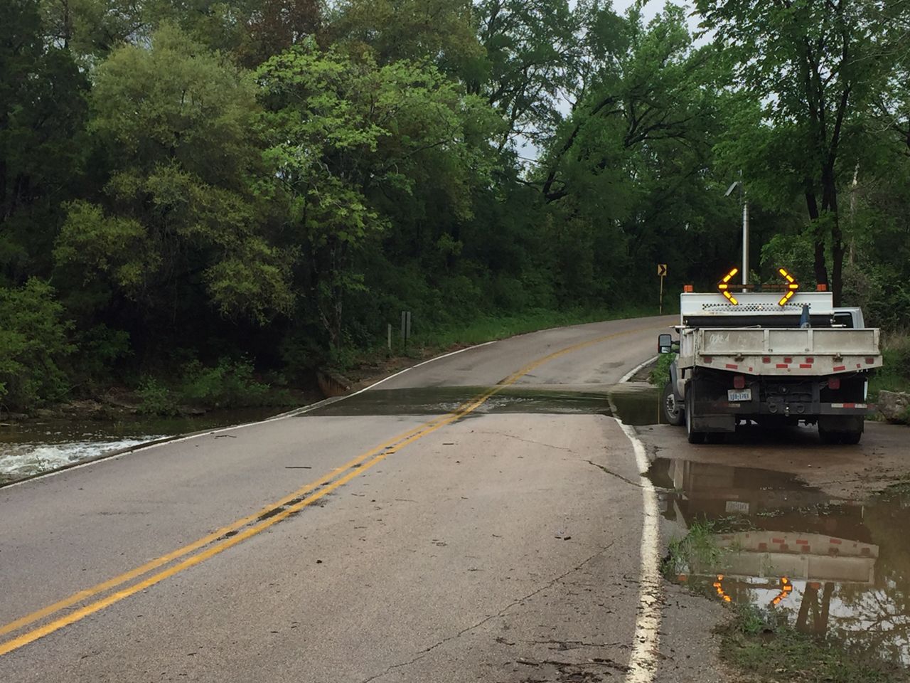 Spicewood Springs Road flooded and closed during rain. 