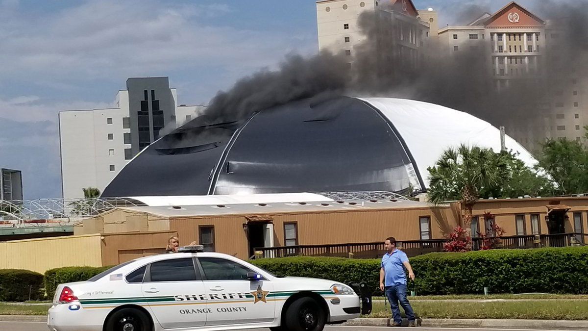 Dark smoke is seen coming from the roof of the Pirate's Dinner Adventure off Carrier Drive in Orlando. (John Serano, Viewer)