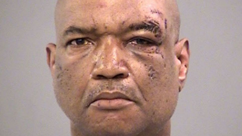 Gary Madison of Indianapolis is seen in an undated booking photo released Sunday, April 8, 2018, by the Marion County Jail. Madison faces three preliminary charges of battery by means of a deadly weapon. Three men suffered severe cuts when a knife-wielding Madison attacked a crowd of people in downtown Indianapolis Saturday afternoon, April 7, after being told to stop playing a siren on a bullhorn, authorities said. (Marion County Jail via AP)
