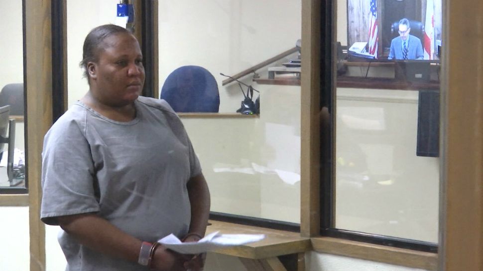 Guettie Belizaire appears before a judge Tuesday. She was granted $5,000 bond for each charge of lewd and lascivious molestation and abuse of an elderly person. (Spectrum News 13)