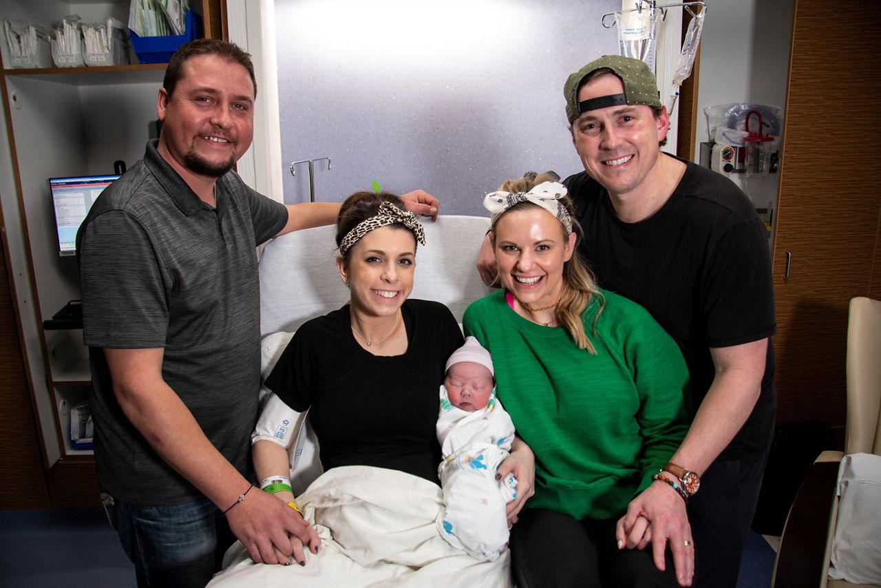 The Gray family and the Birdwell family take a photo together after the baby is born. (Courtesy: Medical City Dallas)