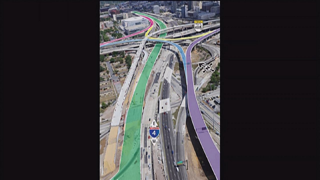 An image from FDOT showing what they are trying to do on I-4 through downtown Orlando. The road in green is what the westbound configuration will look like when it's done. (FDOT)