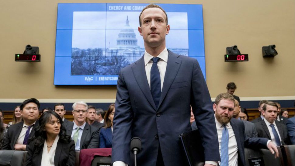 Facebook CEO Mark Zuckerberg arrives to testify before a House Energy and Commerce hearing on Capitol Hill in Washington, Wednesday, April 11, 2018, about the use of Facebook data to target American voters in the 2016 election and data privacy. (AP Photo/Andrew Harnik)