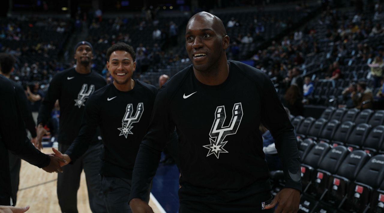 San Antonio Spurs players during a warm-up against the Denver Nuggets April 3, 2019, in Denver. (AP Image)