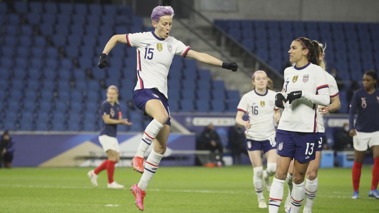 United States' Megan Rapinoe (15) celebrates after scoring on a penalty kick during the first half of an international friendly women's soccer match between the United States and France in Le Havre, France, Tuesday, April 13, 2021. (AP Photo/David Vincent)