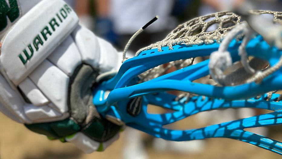 lacrosse stick being held