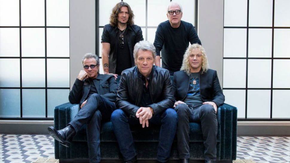 FILE - In this Oct. 19, 2016 file photo, members of Bon Jovi front row from left, Tico Torres, Jon Bon Jovi, David Bryan, back row from left, Phil X and Hugh McDonald post for a portrait in promotion of their new album "This House is Not for Sale" in New York. The band will be inducted to the Rock and Roll Hall of Fame April 14, 2018 in Cleveland, Ohio. (Photo by Drew Gurian/Invision/AP, file)