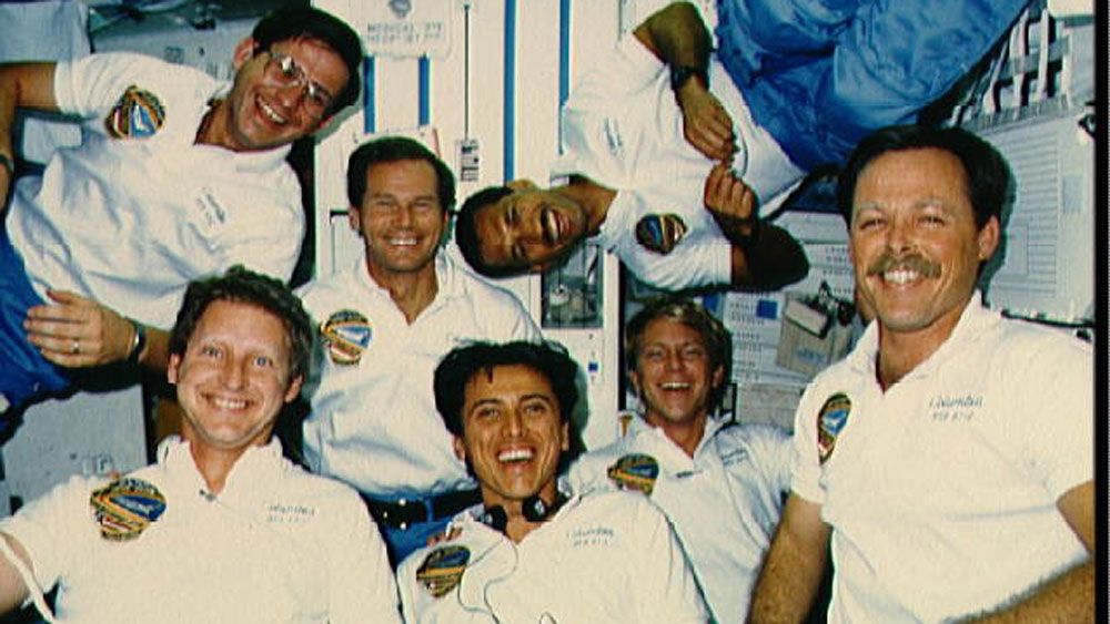 Astronaut Charles Bolden (upper right) with astronaut Bill Nelson (center) on board Space Shuttle Columbia in January 1986. (NASA)
