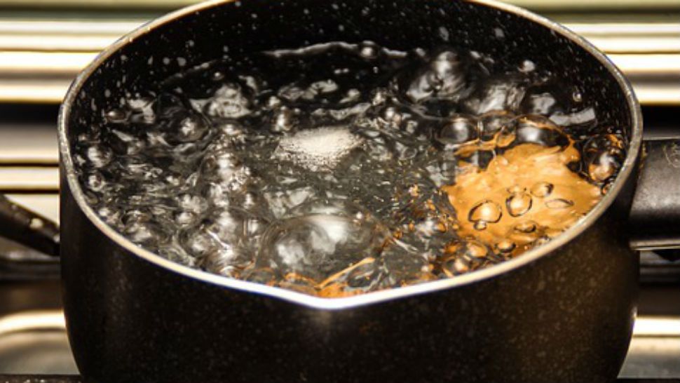 Water is boiled in this file image. (Spectrum News 1/FILE)