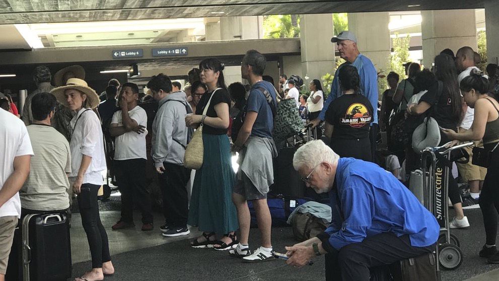 Monday's DOT announcement means travelers passing through Honolulu International Airport and other Hawaii airports no longer have to wear masks. (Associated Press/Leslie Ryan)