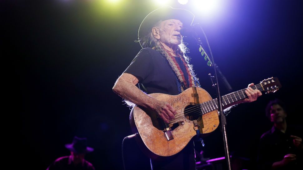 In this Jan. 7, 2017 photo, Willie Nelson performs in Nashville, Tenn. The 83-year-old outlaw country icon wants to help a lot of people give marijuana a try. He’s attached his name to a line of legal marijuana being sold in Colorado and Washington called “Willie’s Reserve,” after decades of personally advocating for the legalization of marijuana. (AP Photo/Mark Humphrey)