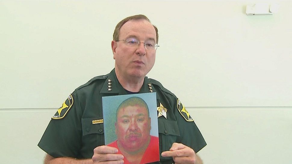The Polk County Sheriff's Office now says that the man accused of attacking a Lake Wales police officer was not deported because of a clerical mistake the office made. 