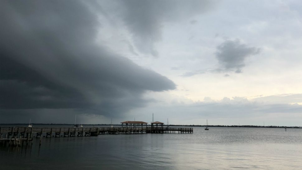 Sent to us with the Spectrum News 13 app: Looking northeast from Eau Gallie Boulevard in Brevard County, a storm front arrives over the Indian River on Friday. (John Tubman/viewer)