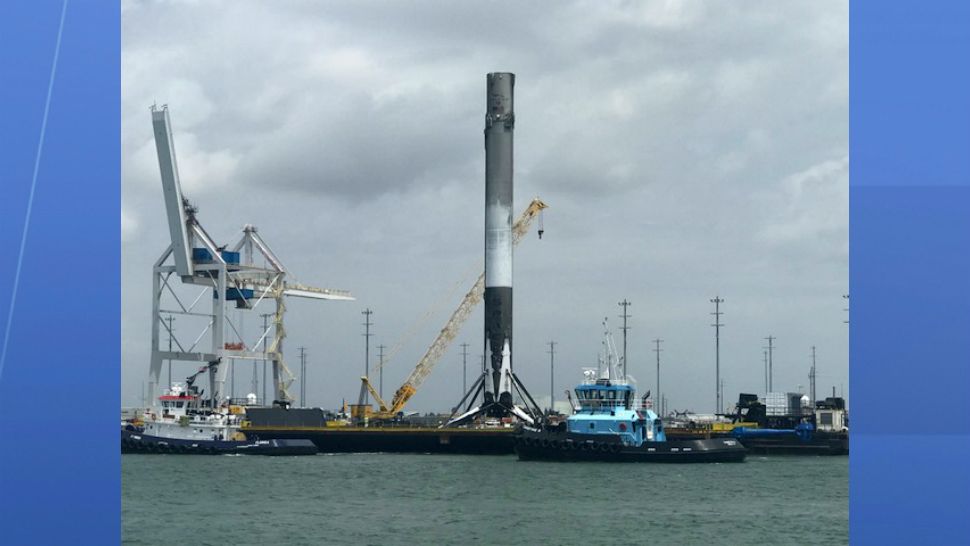 The 1st-stage booster of the Falcon 9 rocket that carried NASA's TESS satellite returns to Port Canaveral on Saturday afternoon. (Greg Pallone, Spectrum News 13)