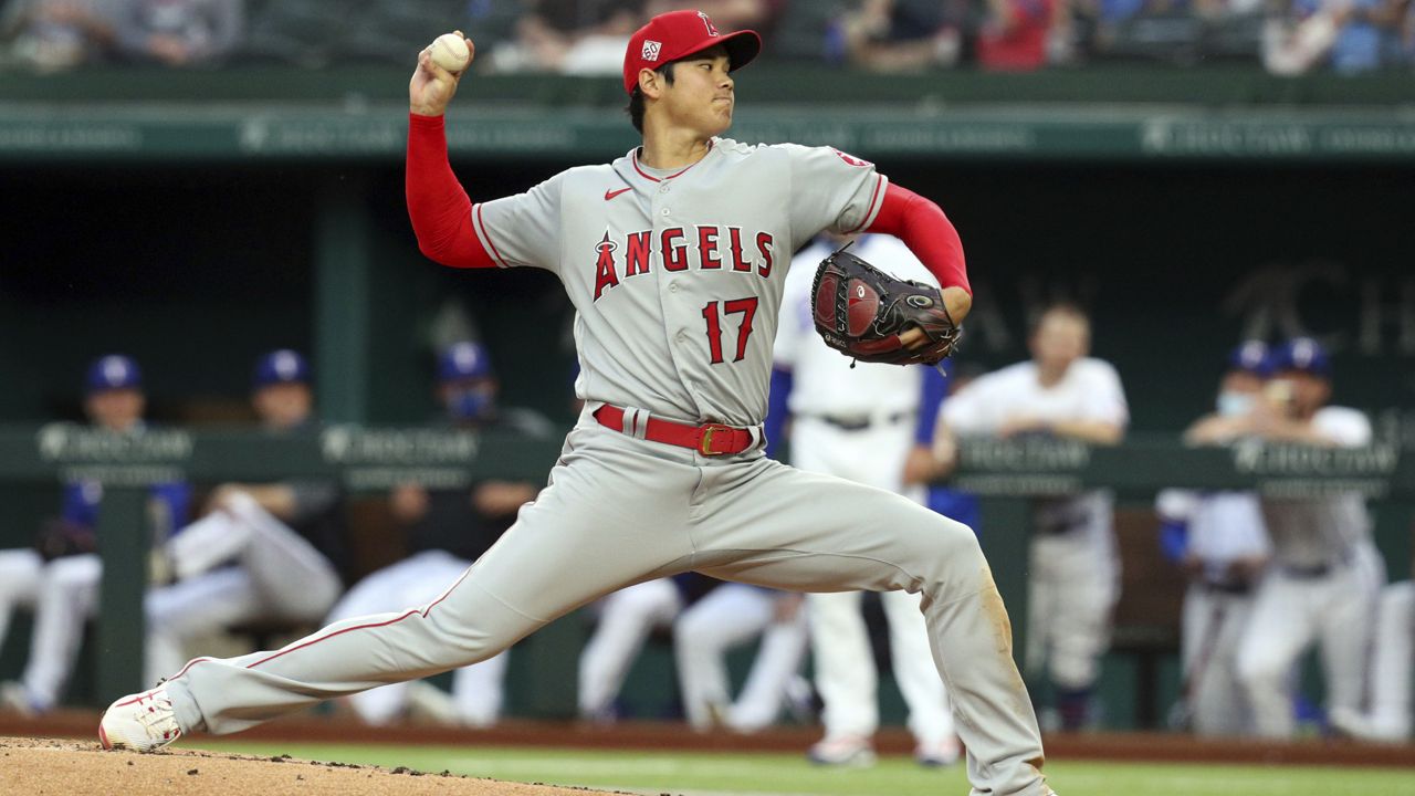 Los Angeles Angels starting pitcher Shohei Ohtani works the first inning against the Texas Rangers during a baseball game on Monday, April 26, 2021, in Arlington, Texas. (AP Photo/Richard W. Rodriguez)