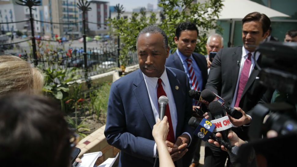 Housing and Urban Development Secretary Ben Carson talks to reporters at the Downtown Women's Center Tuesday, April 24, 2018, in Los Angeles. Carson visited the center to discuss homelessness. (AP Photo/ Jae C. Hong)