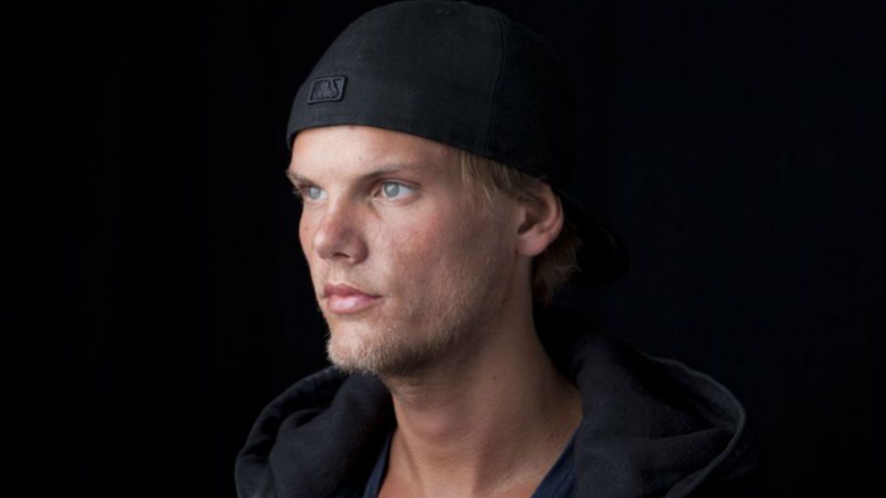 FILE - In this Aug. 30, 2013 file photo, Swedish DJ, remixer and producer Avicii poses for a portrait in New York. Avicii’s family says the late performer “could not go on any longer” in a second statement released this week. The Grammy-nominated electronic dance DJ, born Tim Bergling, was found dead on April 20, 2018, in Muscat, Oman. Details about his death were not revealed. His family says Thursday, April 26, that “our beloved Tim was a seeker, a fragile artistic soul searching for answers to existential questions.” (Photo by Amy Sussman/Invision/AP, File)