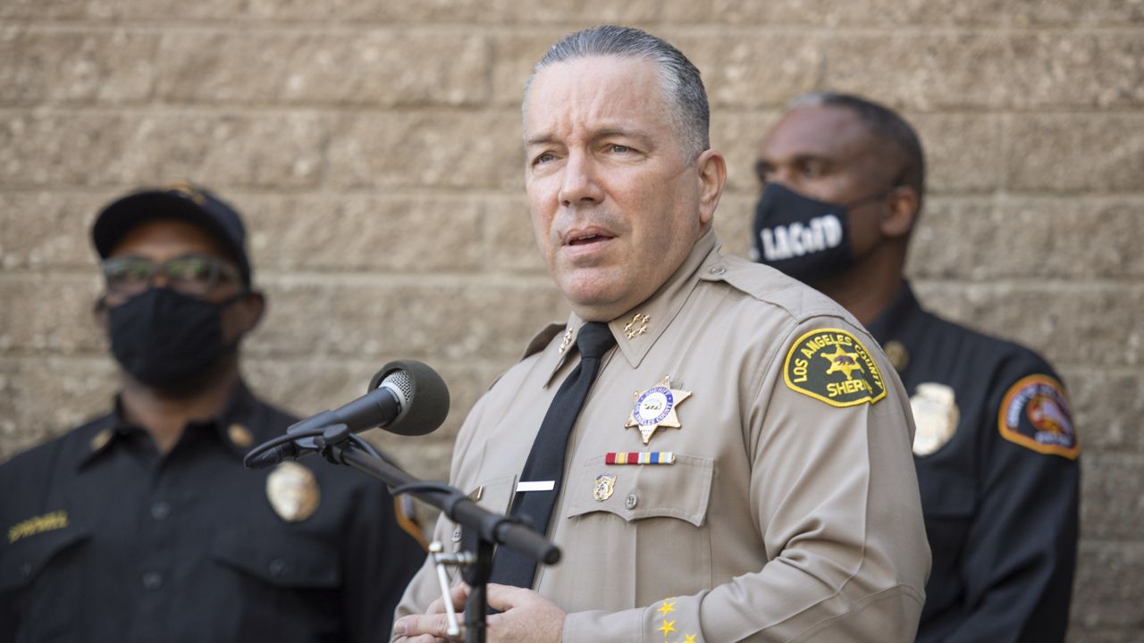 Los Angeles County Sheriff Alejandro Villanueva speaks during a press conference in front of Sheriff Department building in Lomita, Calif., Tuesday, Feb. 23, 2021, regarding golfer Tiger Woods' car accident. (AP Photo/Kyusung Gong)